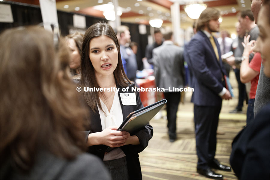 Sarah Clark, senior in computer science, talks with a recruiter during day two of the Career Fair at Embassey Suites with emphasis on Science, Technology, Engineering and Mathematics. February 13, 2019.  Photo by Craig Chandler/University Communication.