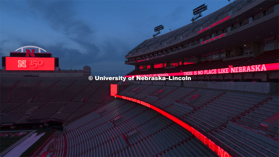 The University of Nebraska’s Memorial Stadium scoreboards lit up in red, proclaim the university's 150th birthday. February 13, 2019. Photo by Craig Chandler/University Communication.