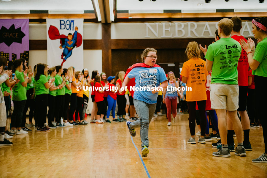 Dance Marathon attendees form a tunnel for the Miracle kids to run through. 1274 Nebraska students signed up to be part of the Huskerthon Dance Marathon for Children's Hospital in Omaha. February 16, 2019. Photo by Justin Mohling / University Communication.