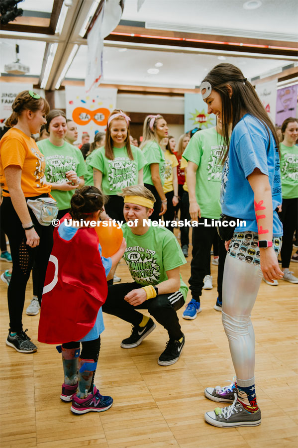 Students learning "Morale dance" with miracle child. 1274 Nebraska students signed up to be part of the Huskerthon Dance Marathon for Children's Hospital in Omaha. February 16, 2019. Photo by Justin Mohling / University Communication.