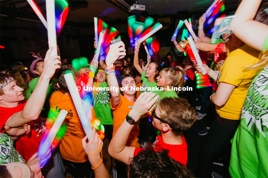 Students participating in a "Rave" by twirling their light sticks around. 1274 Nebraska students signed up to be part of the Huskerthon Dance Marathon for Children's Hospital in Omaha. February 16, 2019. Photo by Justin Mohling / University Communication.