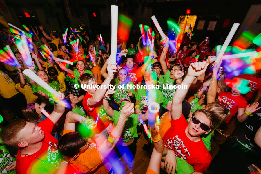Students participating in a "Rave" by twirling their light sticks around. 1274 Nebraska students signed up to be part of the Huskerthon Dance Marathon for Children's Hospital in Omaha. February 16, 2019. Photo by Justin Mohling / University Communication.