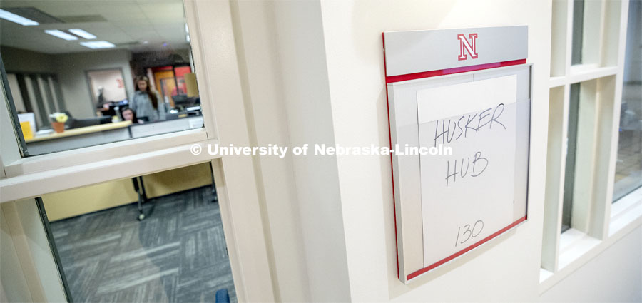 Temporary signs mark the Husker Hub's location in the former CBA Career Services Office. Husker Hub is a new "one-stop" office offering integrated services from the offices of Scholarships and Financial Aid, University Registrar, Bursar and Student Accounts. Husker Hub is where students go to handle the business of being a Husker. March 8, 2019. Photo by Craig Chandler / University Communication.