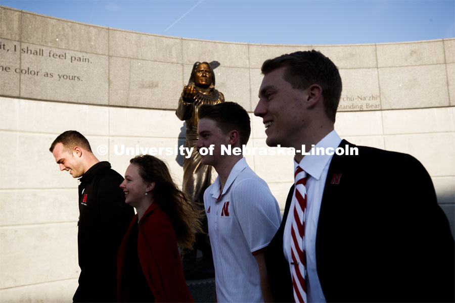 ASUN members walk to the Capitol past the Standing Bear statue. NU Advocacy Day at the Nebraska Legislature. March 27, 2019. Photo by Craig Chandler / University Communication.