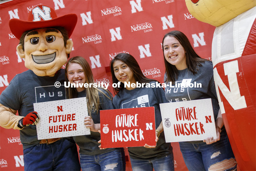 Future Huskers pose with Herbie and Little Red after the FFA signing ceremony for current senior FFA members who have committed to Nebraska. April 3, 2019. Photo by Craig Chandler / University Communication.