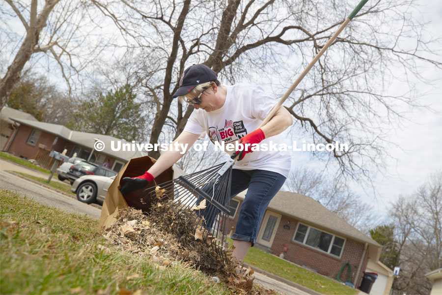 Irene Malzer was part of the Scholarship and Financial Aid team cleaning up a yard in the Big Event. More than 2,500 University of Nebraska–Lincoln students, faculty and staff volunteered for the Big Event on April 6, completing service projects across the community. Now in its 13th year at Nebraska, the Big Event has grown to be the university's single largest student-run community service project. April 6, 2019. Photo by Craig Chandler / University Communication.