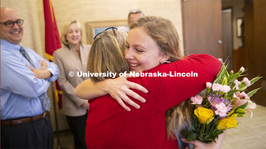 Emily Johnson, a junior at the University of Nebraska, gets a congratulatory hug from Laura Damuth, director of National and International Fellowships after learning she has just been selected as a 2019 Truman Scholar. The Harry S. Truman Scholarship Foundation was created by Congress in 1975 to be the nation’s living memorial to President Harry S. Truman. The Foundation has a mission to select and support the next generation of public service leaders. The Truman award has become one of the most prestigious national scholarships in the United States. April 8, 2019. Photo by Craig Chandler / University Communication.