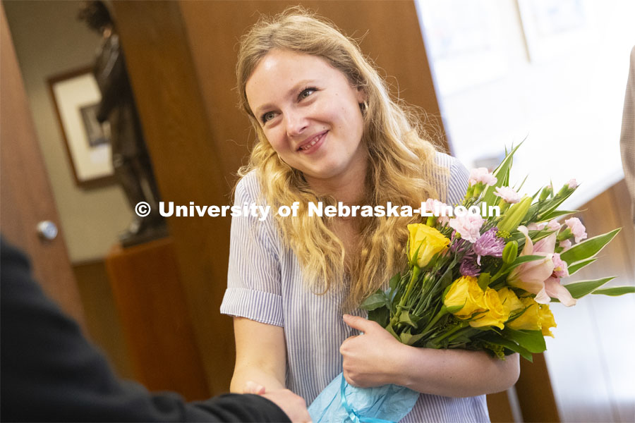 Emily Johnson, a junior at the University of Nebraska, reacts as Chancellor Ronnie Green tells her she has just been selected as a 2019 Truman Scholar. The Harry S. Truman Scholarship Foundation was created by Congress in 1975 to be the nation’s living memorial to President Harry S. Truman. The Foundation has a mission to select and support the next generation of public service leaders. The Truman award has become one of the most prestigious national scholarships in the United States. April 8, 2019. Photo by Craig Chandler / University Communication.