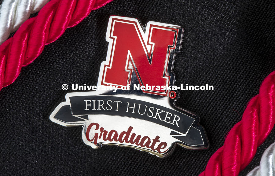 Pin to be given to First Husker Graduates. April 30, 2019. Photo by Craig Chandler / University Communication.