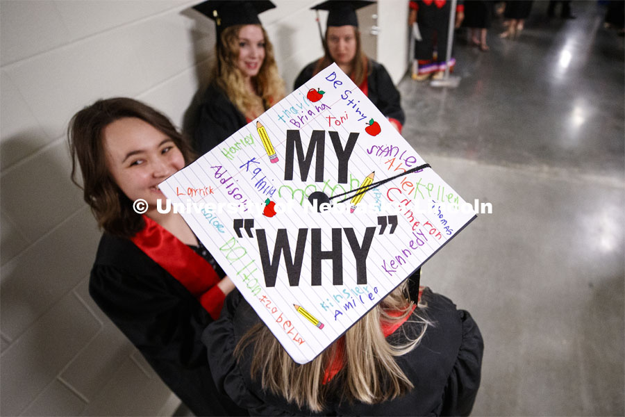 Katharine Henely's mortar board shows her love for her students. Henley student taught at Lincoln's Arnold Elementary and her kindergarten students all signed her mortar board. Undergraduate commencement at Pinnacle Bank Arena, May 4, 2019. Photo by Craig Chandler / University Communication.