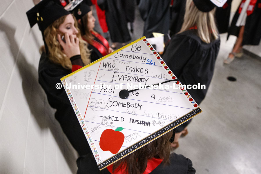Ashley Goosic's mortar board shows her love for her students. Goosic student taught at Lincoln's Everett Elementary and her third-grade students all signed her mortar board. Undergraduate commencement at Pinnacle Bank Arena, May 4, 2019. Photo by Craig Chandler / University Communication.