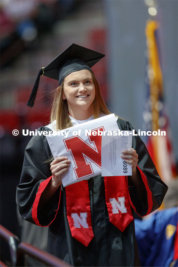 Alex Hruby smiles after receiving her Engineering degree Saturday afternoon. Undergraduate commencement at Pinnacle Bank Arena, May 4, 2019.  Photo by Craig Chandler / University Communication.