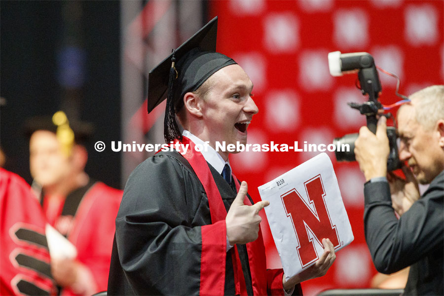 Logan Piening of Lincoln smiles after receiving his Engineering degree Saturday afternoon. Undergraduate commencement at Pinnacle Bank Arena, May 4, 2019.  Photo by Craig Chandler / University Communication.