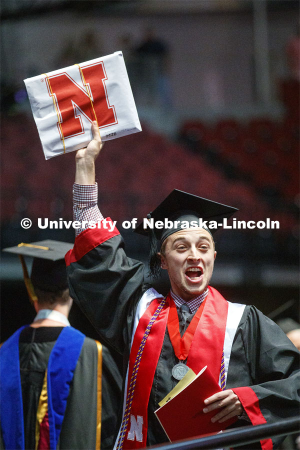 Justin Hicklin celebrates his Arts and Sciences degree. Undergraduate commencement at Pinnacle Bank Arena, May 4, 2019. Photo by Craig Chandler / University Communication.