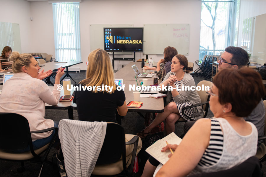 (L to R) Julie Tegeler, Peggy Dnyek, Kathy Thagard, Grant Scribner (UNL grad student), Brenda Wandzilak, Stacey Haney brainstorm about ways to incorporate History Harvest into the classroom. June 5, 2019. Photo by Gregory Nathan / University Communication.