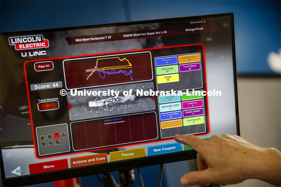 After a weld, the virtual welder training machine will give a readout of several parameters. Nebraska Innovation Studio. June 14, 2019.  Photo by Craig Chandler / University Communication.