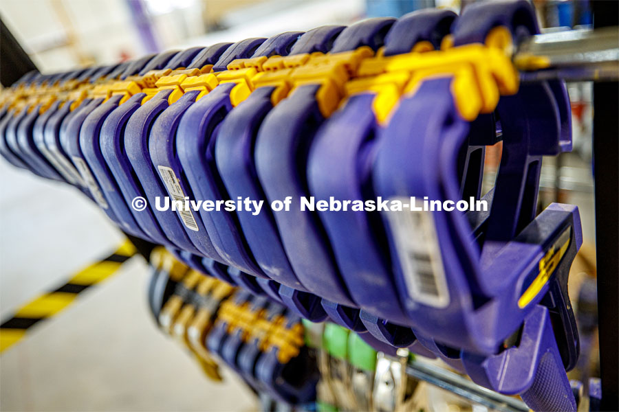 A row of wood clamps in Nebraska Innovation Studio. June 14, 2019. Photo by Craig Chandler / University Communication.
