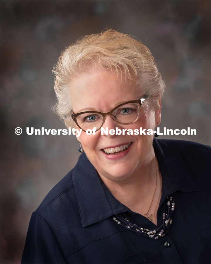 Studio portrait of Judy Anderson, Editorial/Office Associate at University Communication. June 24, 2019. Photo by Greg Nathan / University Communication.