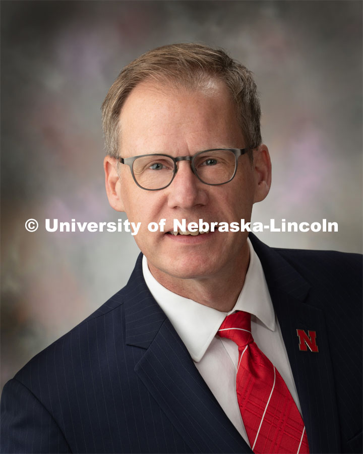 Studio portrait of Mark Button, Tenure Professor, Political Science, and Dean for College of Arts and Sciences. July 10, 2019. Photo by Greg Nathan / University Communication.