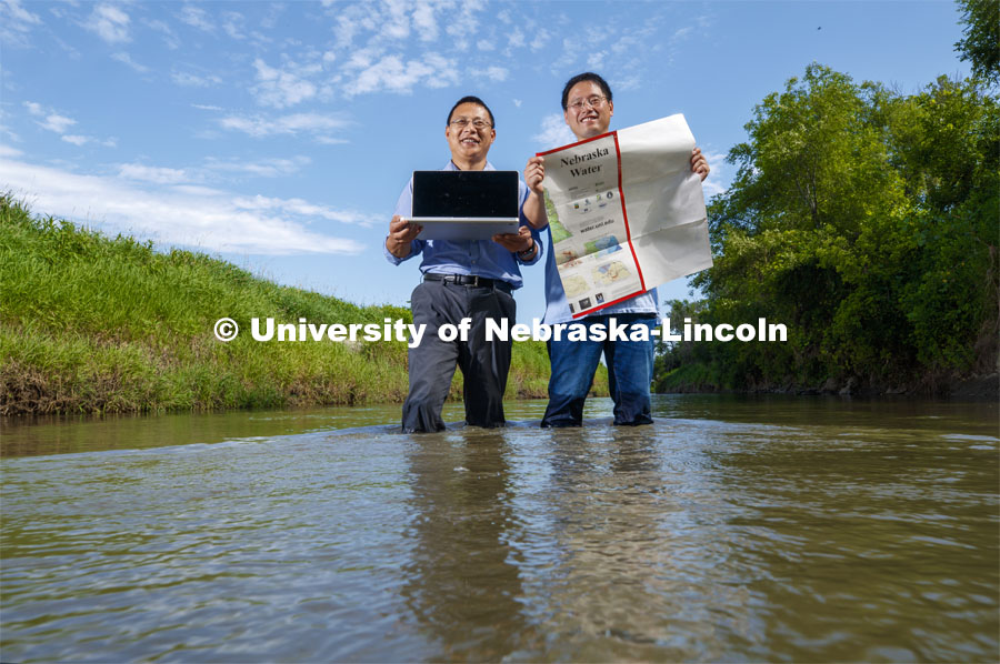 Zhenghong Tang, left, and Hongfeng Yu have developed the INSIGHT web platform to share water resources data with professionals and the general public. Photo used for 2018-2019 Annual Report on Research at Nebraska. July 15, 2017. Photo by Craig Chandler / University Communication.