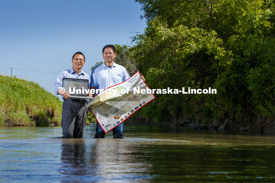 Zhenghong Tang, left, and Hongfeng Yu have developed the INSIGHT web platform to share water resources data with professionals and the general public. Photo used for 2018-2019 Annual Report on Research at Nebraska. July 15, 2017. Photo by Craig Chandler / University Communication.