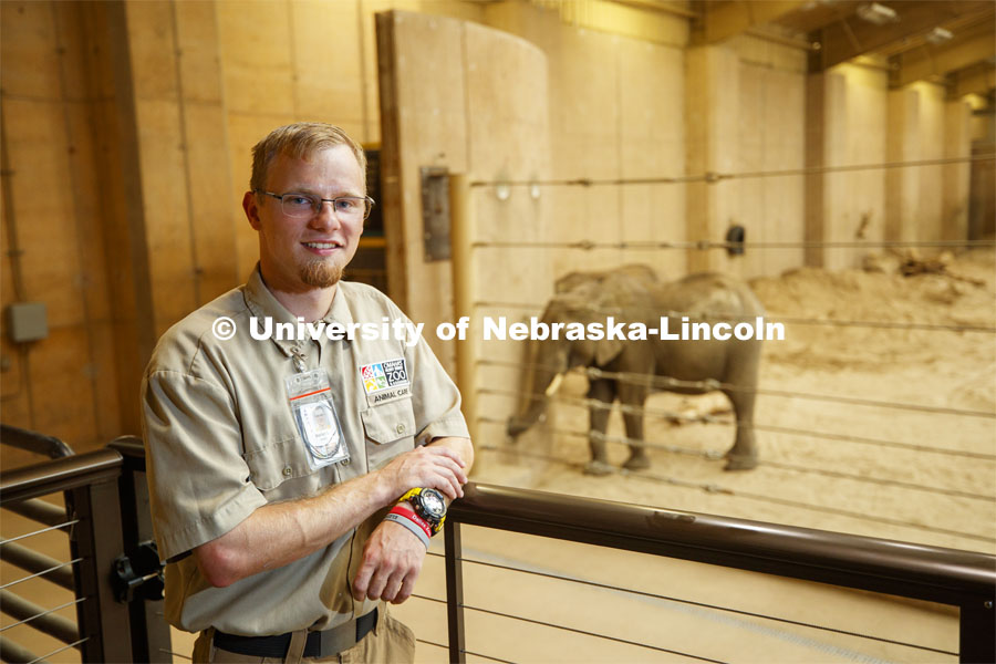 Stefan Lechnowsky, a senior Fisheries and Wildlife major at Nebraska, helps look after elephants during his internship this summer at Omaha's Henry Doorly Zoo and Aquarium after an early summer study abroad studying them in Africa. July 29, 2019. Photo by Craig Chandler / University Communication.