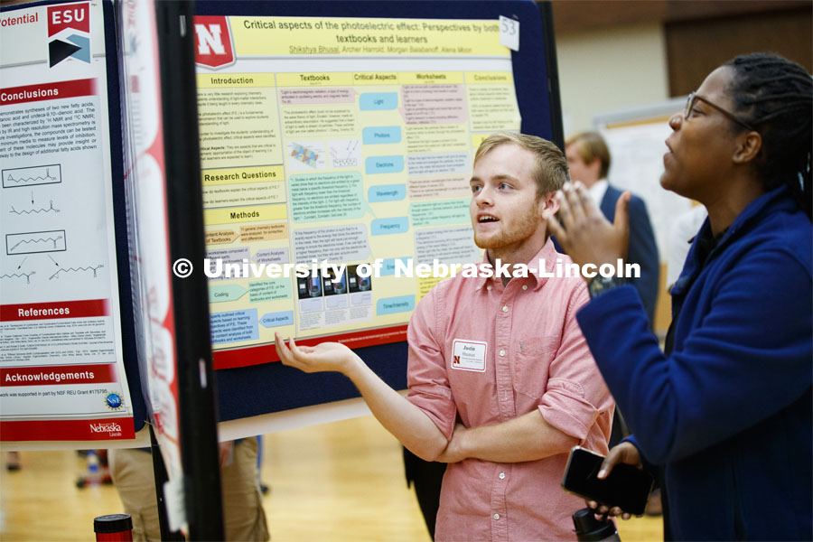 J. Kenny Shuman, discusses his summer research on student concerns in introductory STEM courses. Summer Research poster session in the Nebraska Union. August 7, 2019. Photo by Craig Chandler / University Communication.