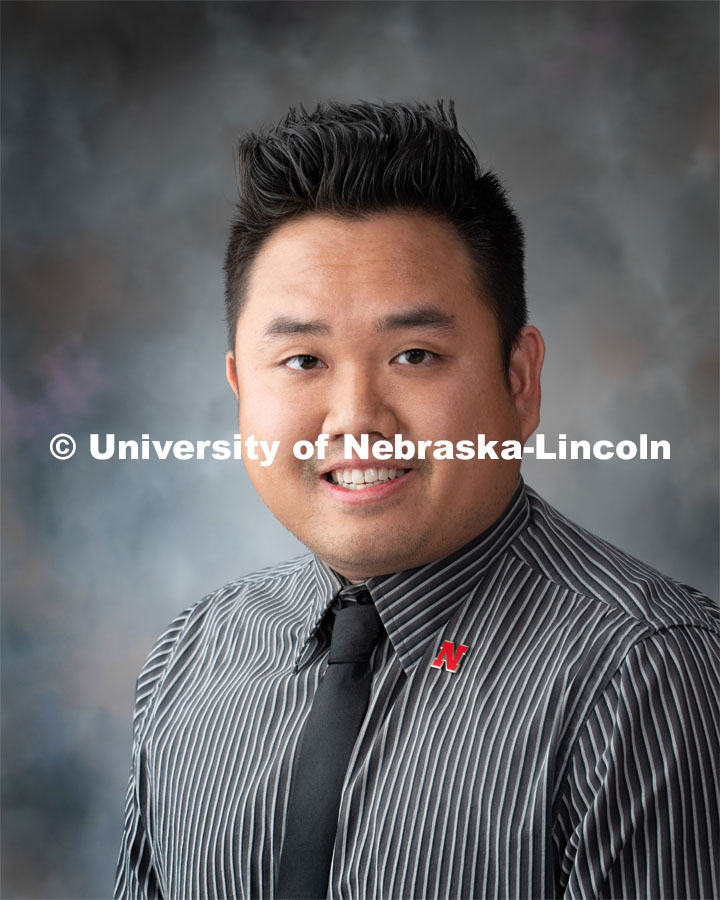 Studio portrait of Donny Bui, Academic Success Coach for First Year Experience and Transition Programs. August 12, 2019. Photo by Greg Nathan / University Communication.