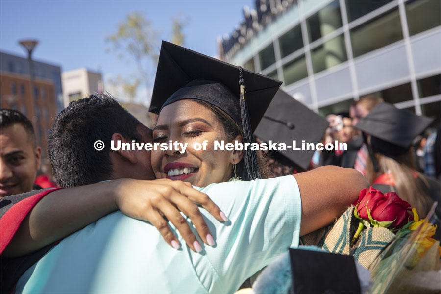 Lincy Gabriela Meraz Menocal is surrounded by family and friends following commencement. 2019 Summer Commencement at Pinnacle Bank Arena. August 17, 2019. Photo by Craig Chandler / University Communication.