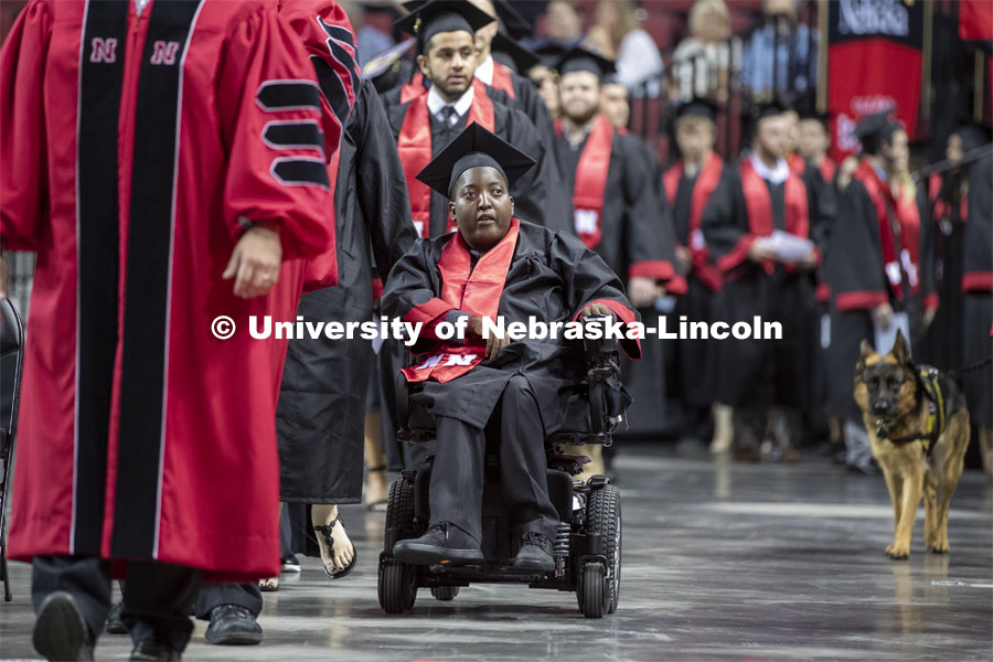 Amori Strong enters the arena. She graduated after leaving the Lincoln area because of health reasons and completing her degree online. She returned for the ceremony. 2019 Summer Commencement at Pinnacle Bank Arena. August 17, 2019. Photo by Craig Chandler / University Communication.