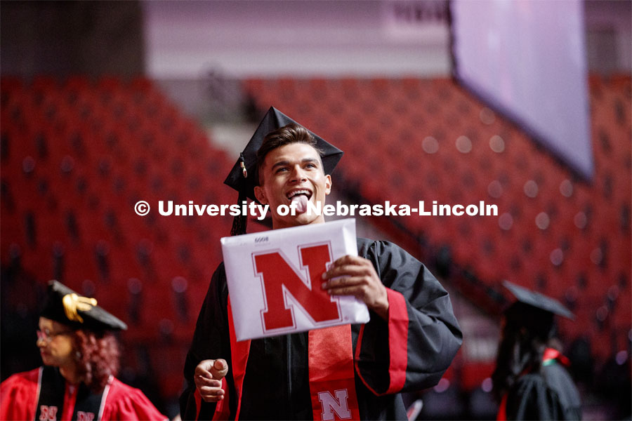 Jace Anderson celebrates his arts and sciences degree. 2019 Summer Commencement at Pinnacle Bank Arena. August 17, 2019. Photo by Craig Chandler / University Communication.