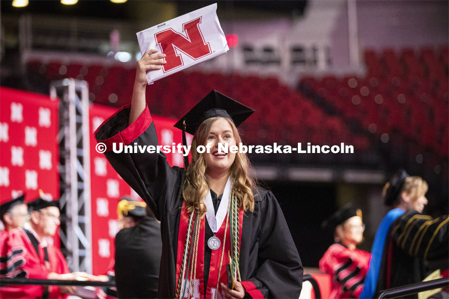 Whitney Heuermann celebrates her animal sciences degree. 2019 Summer Commencement at Pinnacle Bank Arena. August 17, 2019. Photo by Craig Chandler / University Communication.
