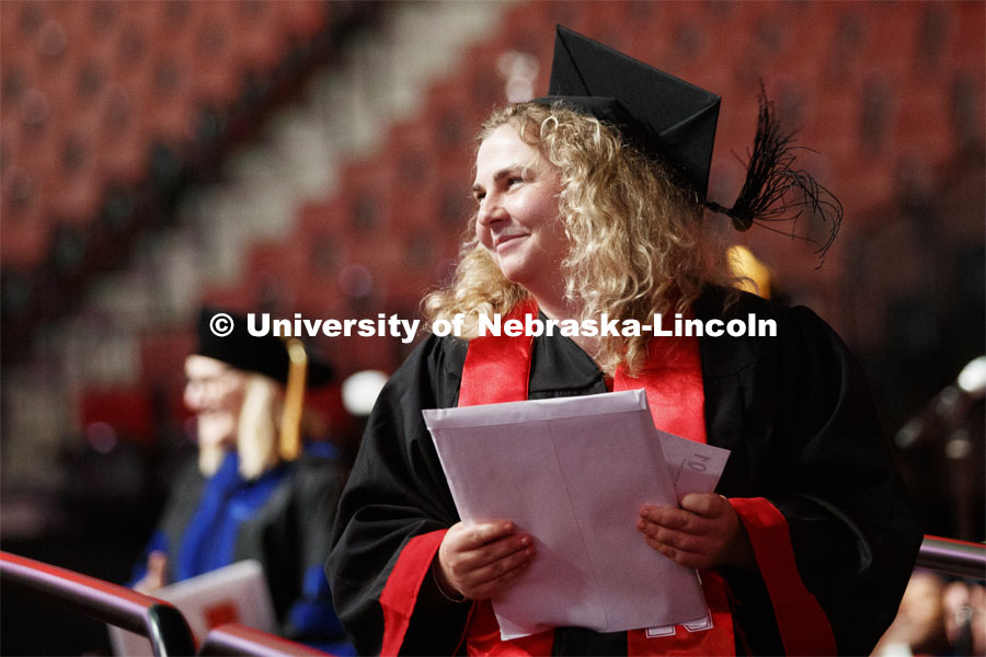 Grace Bradford smiles at her friends and family after receiving her degree. 2019 Summer Commencement at Pinnacle Bank Arena. August 17, 2019. Photo by Craig Chandler / University Communication.