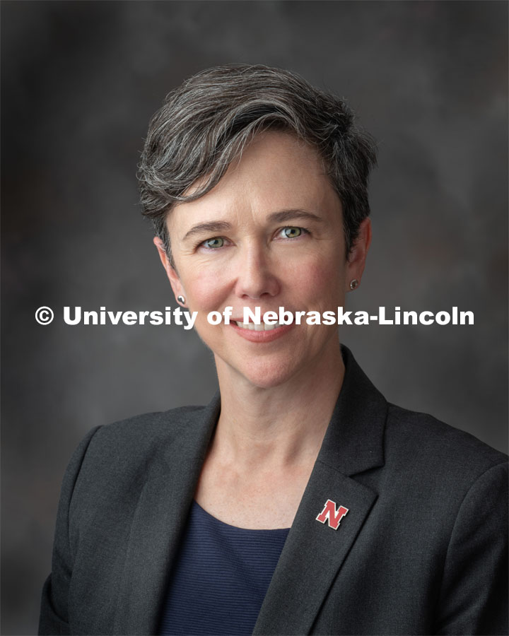 Studio portrait of Claire Stewart, Dean of Libraries. August 21, 2019. Photo by Greg Nathan / University Communication.