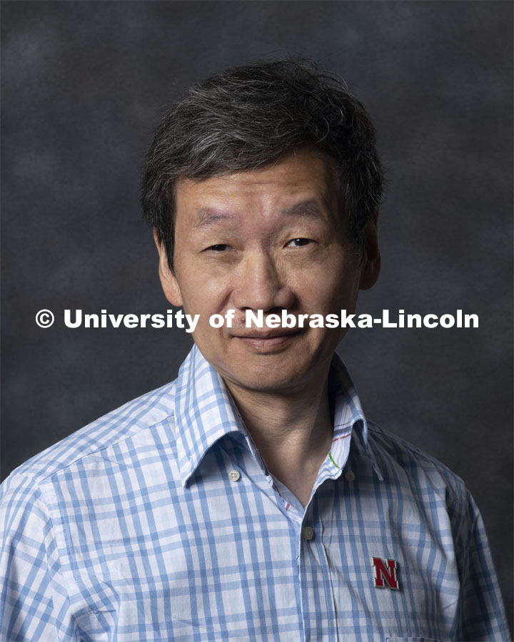 Studio portrait of Dongchu Sun, Research Professor, Statistics. New Faculty. August 21, 2019. Photo by Greg Nathan / University Communication Photography.