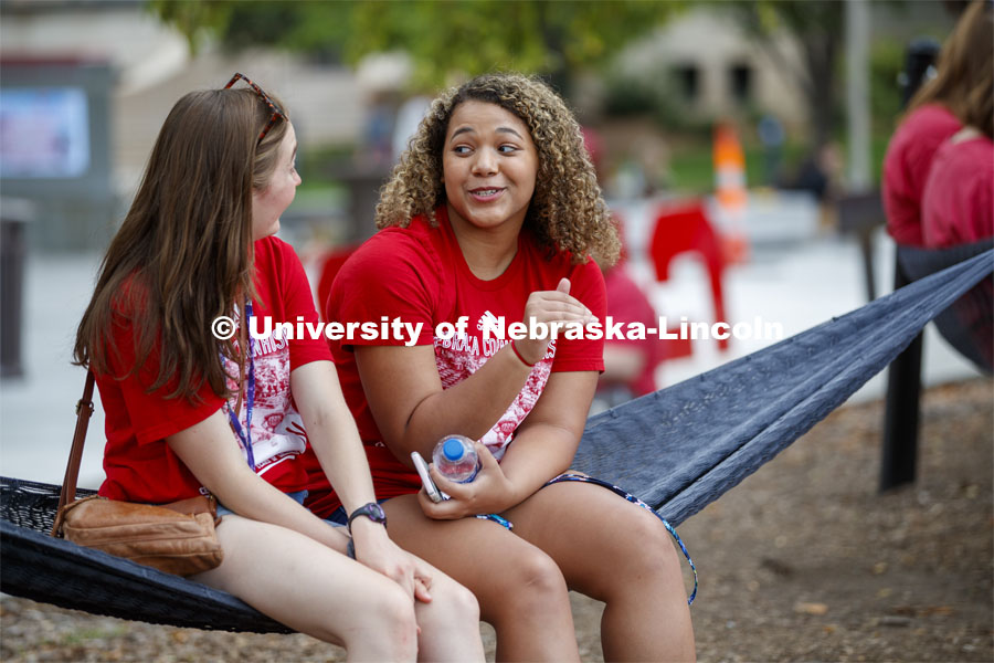 Caressa Jones of Omaha talks with Sarah Baker of Colorado Springs at the Big Red Welcome, Chancellor's BBQ for incoming freshman and new students on the greenspace by the Memorial Union. August 23, 2019. Photo by Craig Chandler / University Communication.