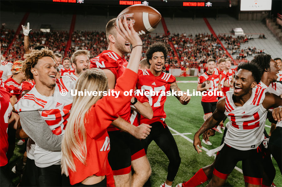 Student making a catch and the team going wild, she was the only one to catch the ball. Students got to check out the 2019 Husker Football Team at the Big Red Welcome Boneyard Bash. The first 2500 students got a free slice of Valentino’s pizza, water, and a 2019 Official Boneyard t-shirt. August 24, 2019. Photo by Justin Mohling / University Communication.