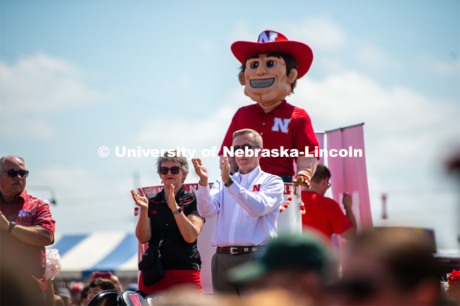 Herbie, Ronnie and Jane Green cheer on the band. The University of Nebraska represents and celebrates their 150th year anniversary at the Nebraska State Fair in Grand Island, Nebraska. August 1, 2019. Photo by Justin Mohling for University Communication.
