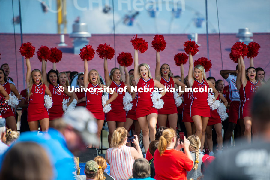 Husker cheerleaders at the Nebraska State Fair pep rally. The University of Nebraska represents and celebrates their 150th year anniversary at the Nebraska State Fair in Grand Island, Nebraska. August 1, 2019. Photo by Justin Mohling for University Communication.