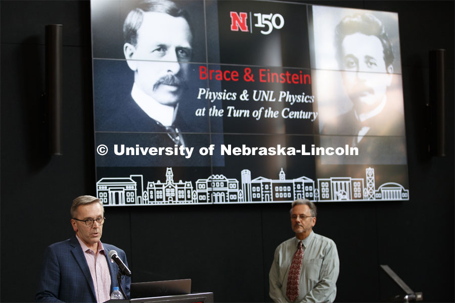 Daniel Claes, department chair and professor of Physics and Astronomy, demonstrates how light bends while going through an object. The lecture was the September N150 Nebraska Lecture. September 10, 2019. Photo by Craig Chandler / University Communication.