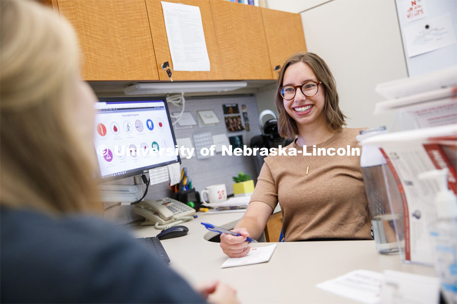 Academic Advisor, Rebecca Carr, meets with students and helps them explore different options for their college major. Explore Center photo shoot. September 10, 2019. Photo by Craig Chandler / University Communication.