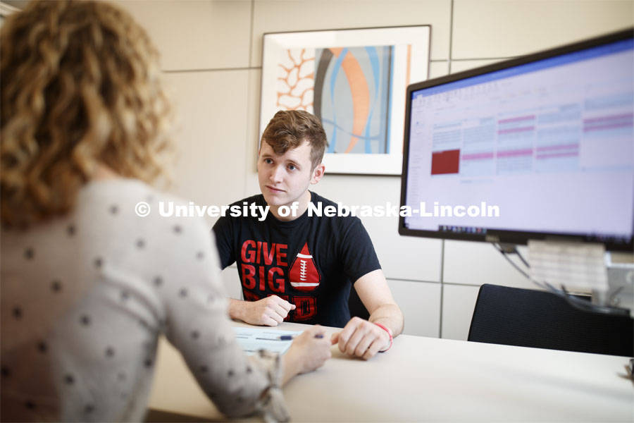 Students working with an academic advisor at the Explore Center. Explore Center photo shoot. September 10, 2019. Photo by Craig Chandler / University Communication.