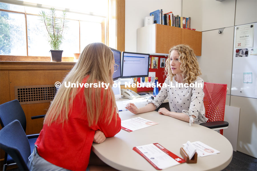 Kristin Plath, Academic Advisor, meets with students to help them find a college major. Explore Center photo shoot. September 10, 2019. Photo by Craig Chandler / University Communication.
