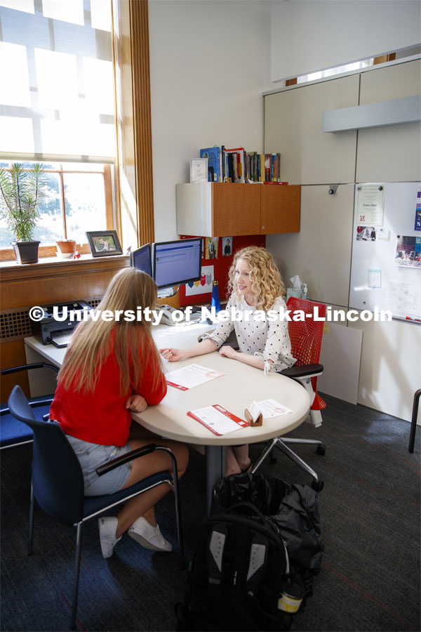 Kristin Plath, Academic Advisor, meets with students to help them find a college major. Explore Center photo shoot. September 10, 2019. Photo by Craig Chandler / University Communication.