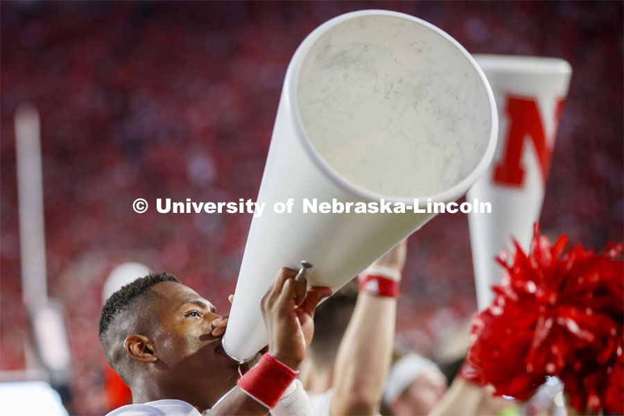 Ramarro Lamar, one of the male cheerleaders, leads the crowd in a cheer. Nebraska vs. Northern Illinois football game. September 14, 2019. Photo by Craig Chandler / University Communication.