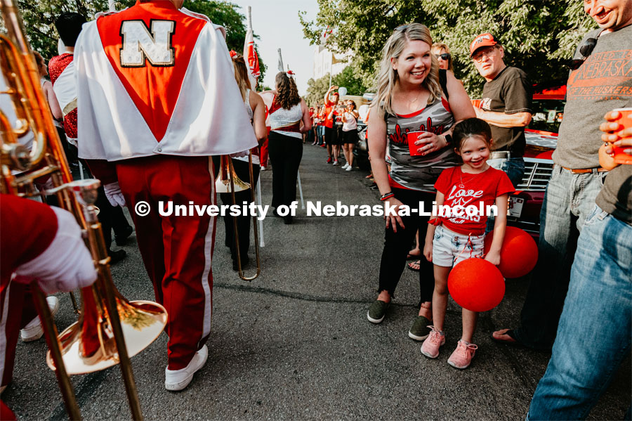 Kid excited to see The Cornhusker Marching Band march by. Nebraska vs. Northern Illinois football game. September 14, 2019. Photo by Justin Mohling / University Communication.