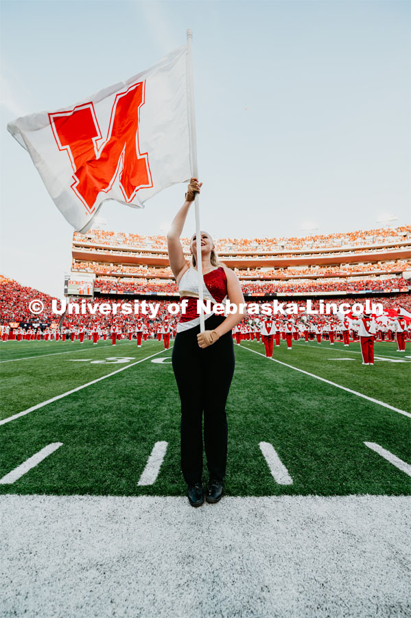 Cornhusker Marching Band Color Guard member on the field. Nebraska vs. Northern Illinois football game. September 14, 2019. Photo by Justin Mohling / University Communication.