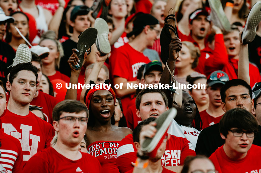 Students with shoes up for Shoes Off- Kickoff. Nebraska vs. Northern Illinois football game. September 14, 2019. Photo by Justin Mohling / University Communication.