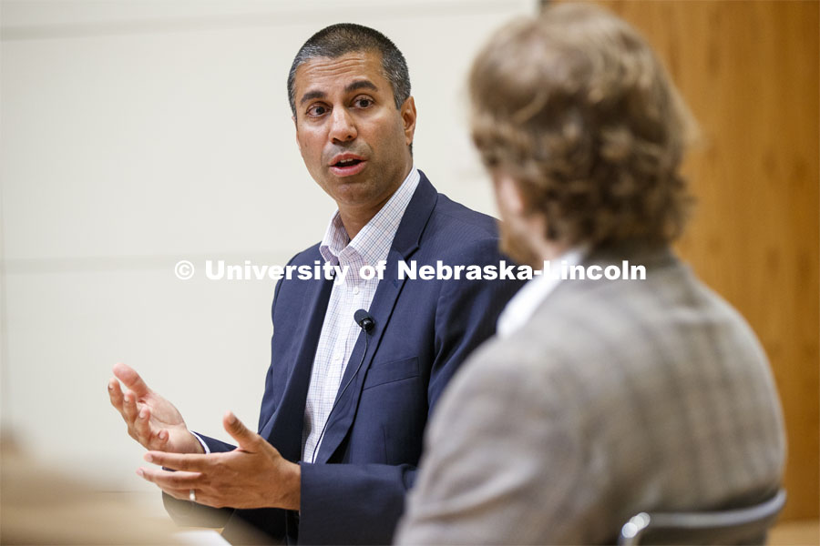 Ajit Pai, chairman of the Federal Communications Commission, talks with Gus Hurwitz, Co-Director, Space/Cyber/Telecomm Program and College of Law Associate Professor, at a fireside chat in the Nebraska Union auditorium. Pai visited the University of Nebraska–Lincoln on Sept. 18. The visit is hosted by the University of Nebraska College of Law’s Space, Cyber and Telecommunications Law program and its co-director Gus Hurwitz. September 18, 2019. Photo by Craig Chandler / University Communication.