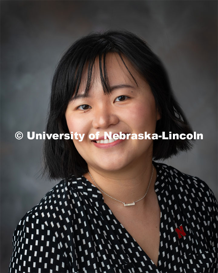 Studio portrait of Liwei He, Accounting. September 24, 2019. Photo by Gregory Nathan / University Communication.